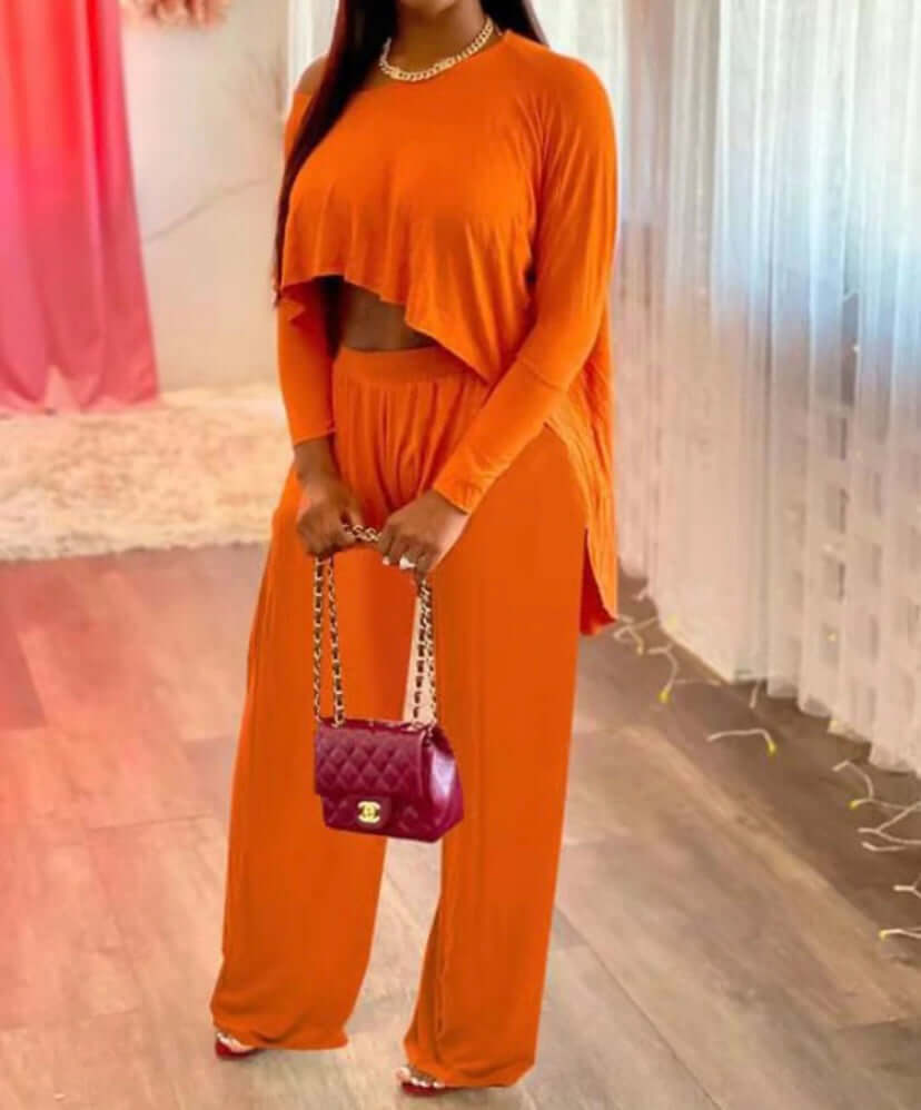 orange two-piece crop top pants set